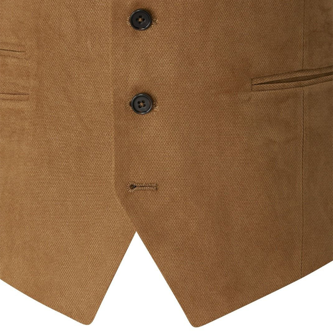 Close-up of a brown vest with buttons on a white background