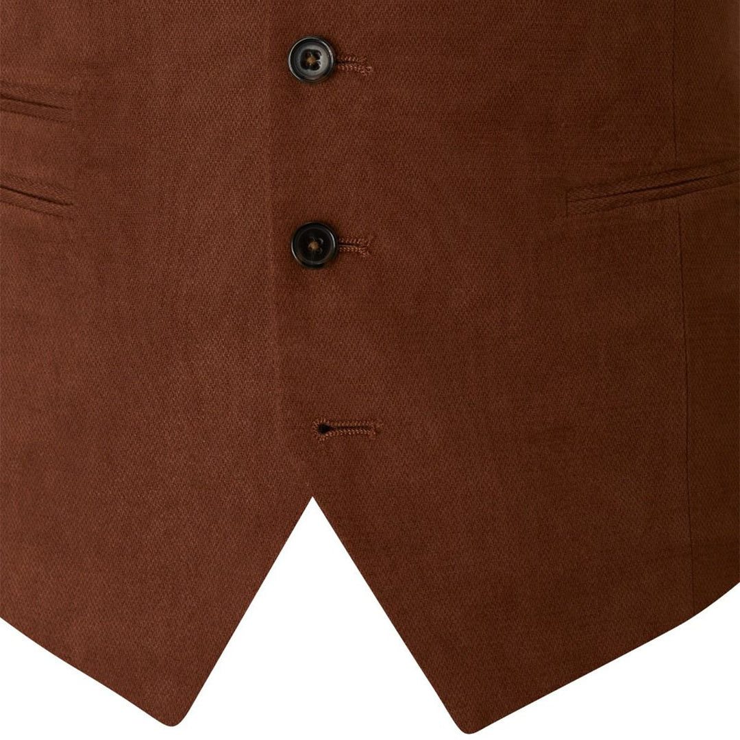 Close-up of a brown vest with two buttons on a white background