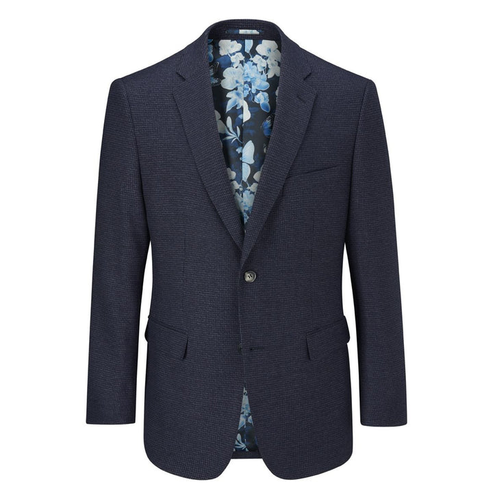 Navy blazer with floral shirt on a white background
