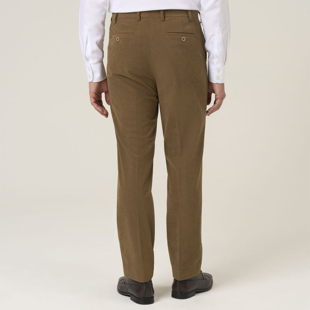 Brown pants worn by a person on a white background