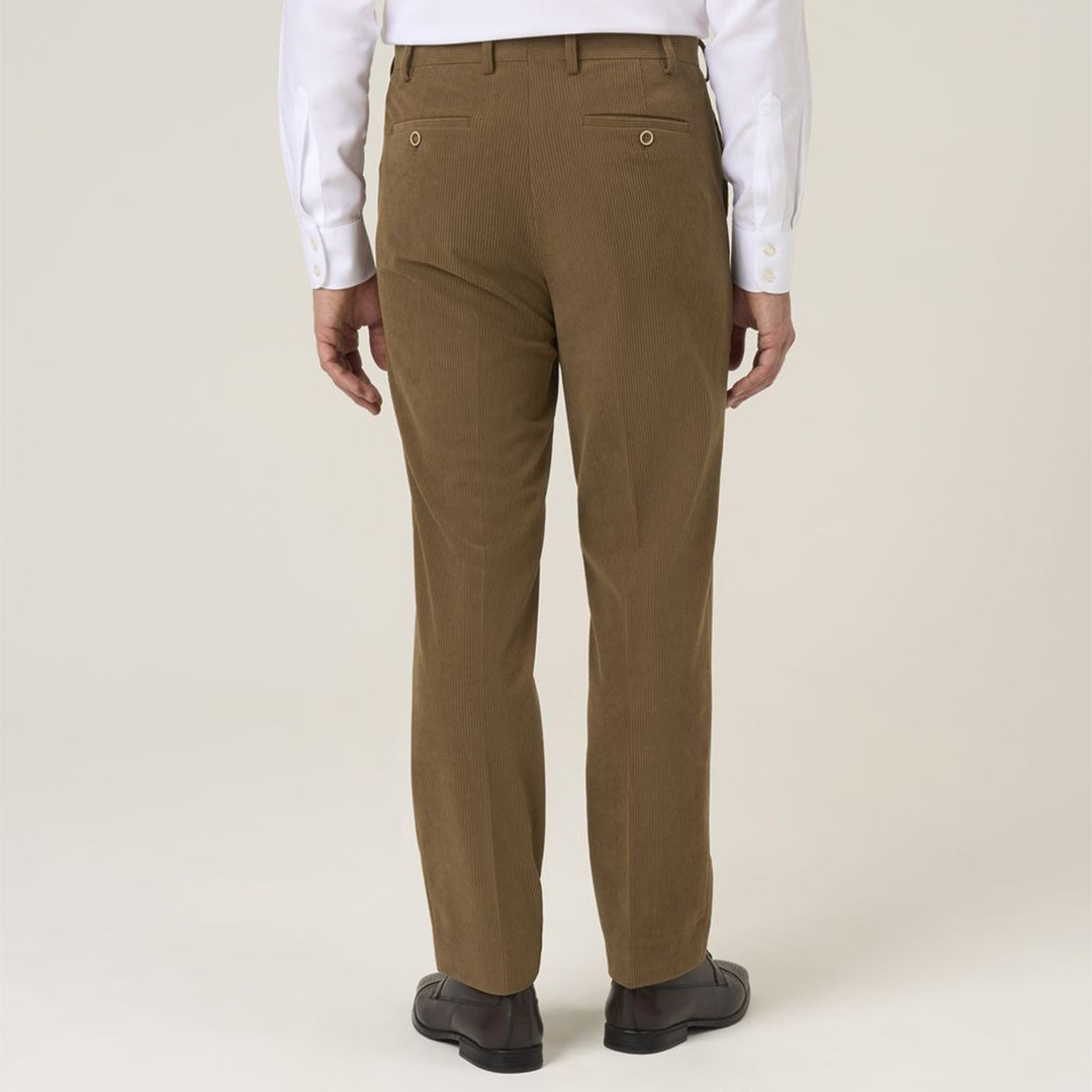Brown pants worn by a person on a white background