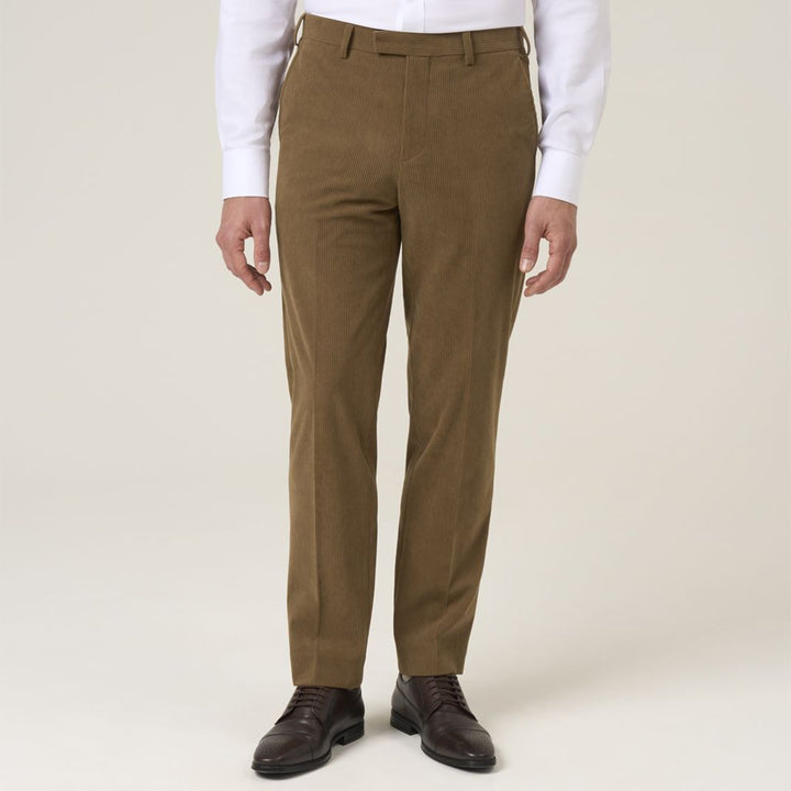 Brown dress pants worn by a person on a plain background