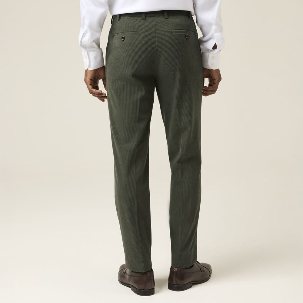 Green dress pants worn by a person on a plain background