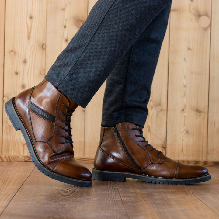 Bugatti Caj cognac brown mens leather ankle boots worn with navy trousers