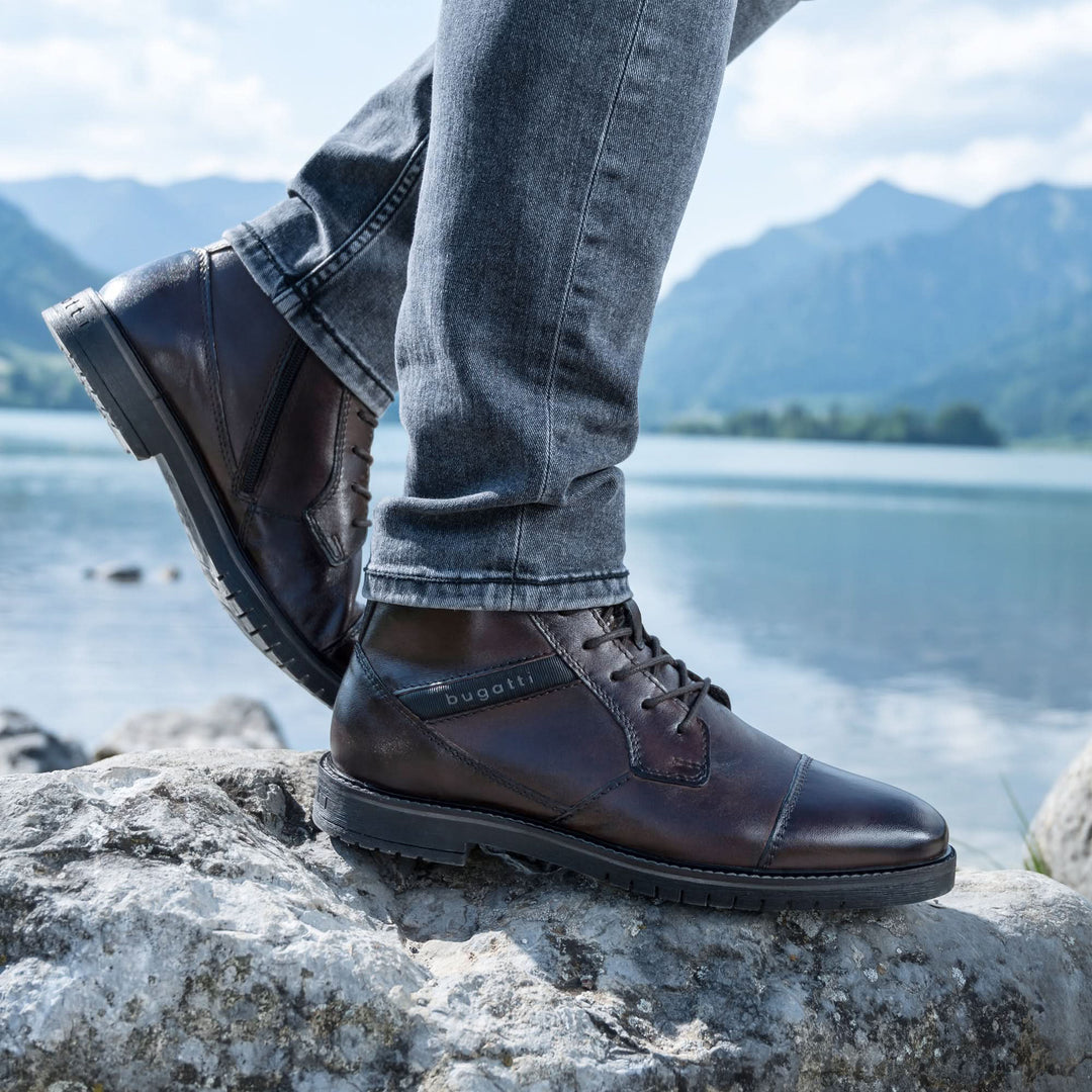 Bugatti Caj mid brown mens leather ankle boots worn with dark trousers