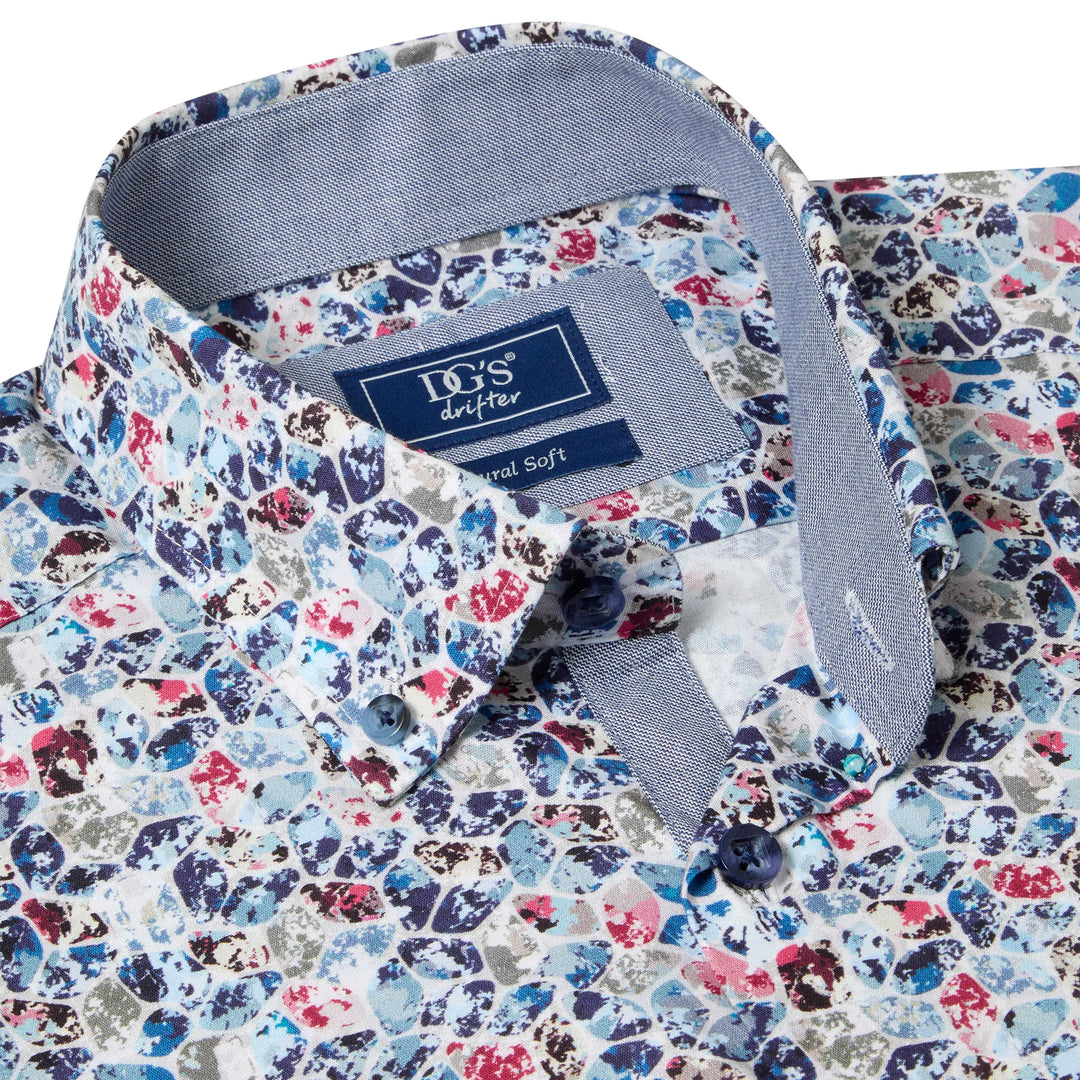 Colorful patterned shirt with a visible brand label on a white background