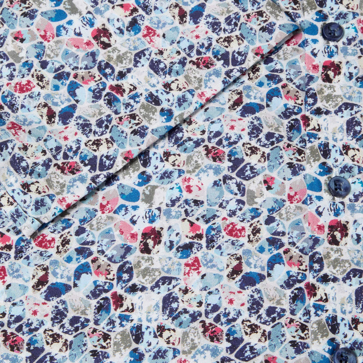 Multicolored patterned fabric with a button on a white background