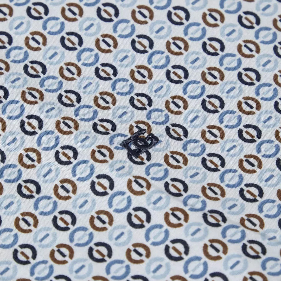 Patterned fabric with blue, brown, and black circles on a white background