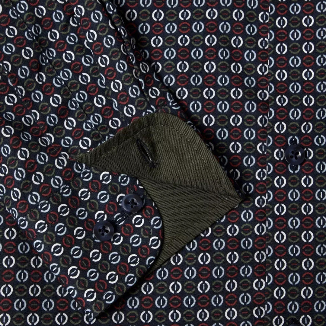 Dark green fabric with a pattern on a matching background