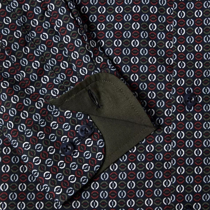 Dark green fabric with a pattern on a matching background