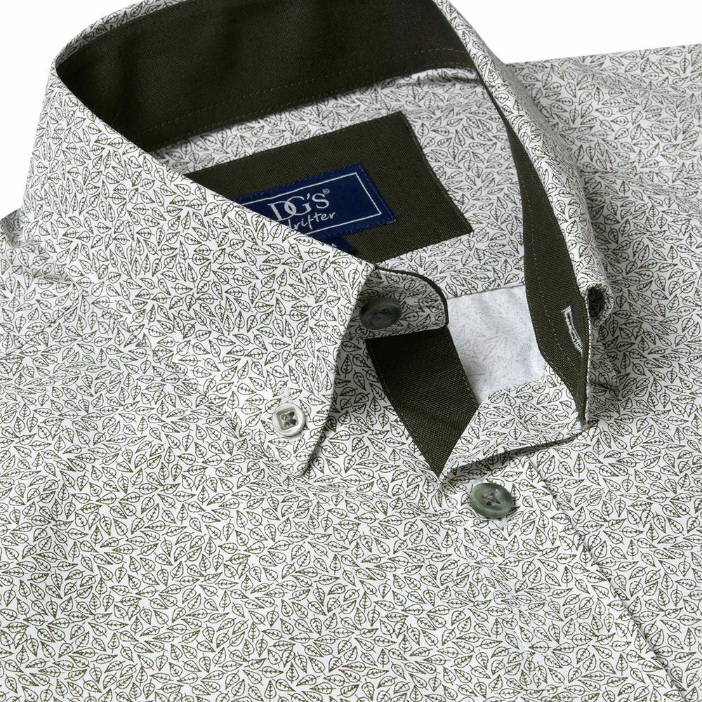 Close-up of a patterned shirt with a brand label on a white background
