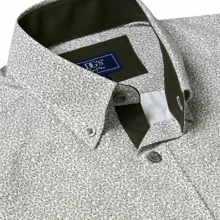 Close-up of a patterned shirt with a brand label on a white background