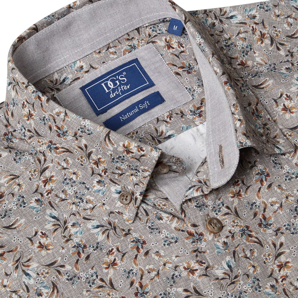 Floral patterned shirt with a brand label on a white background