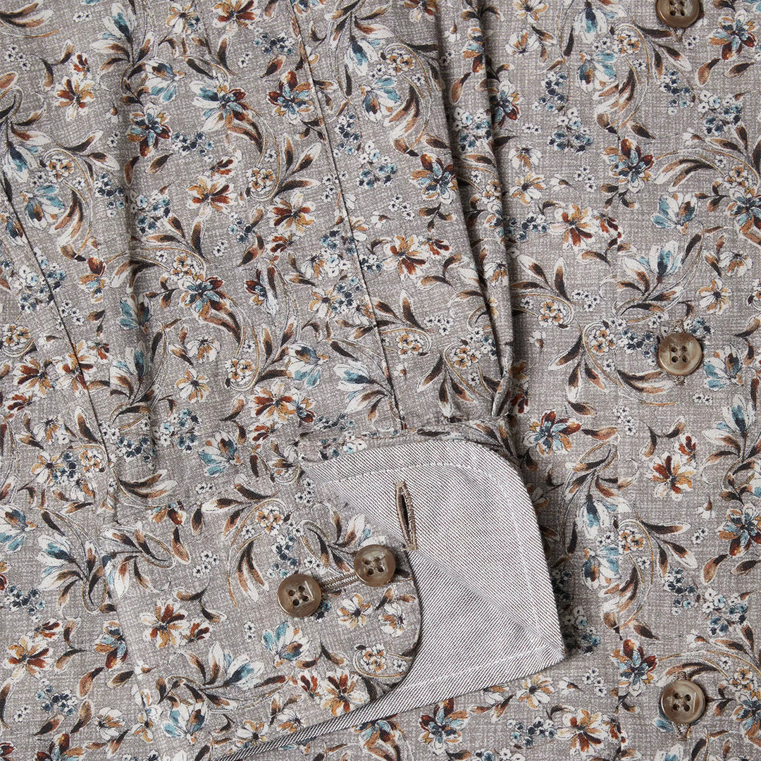 Floral patterned fabric with buttons on a gray background
