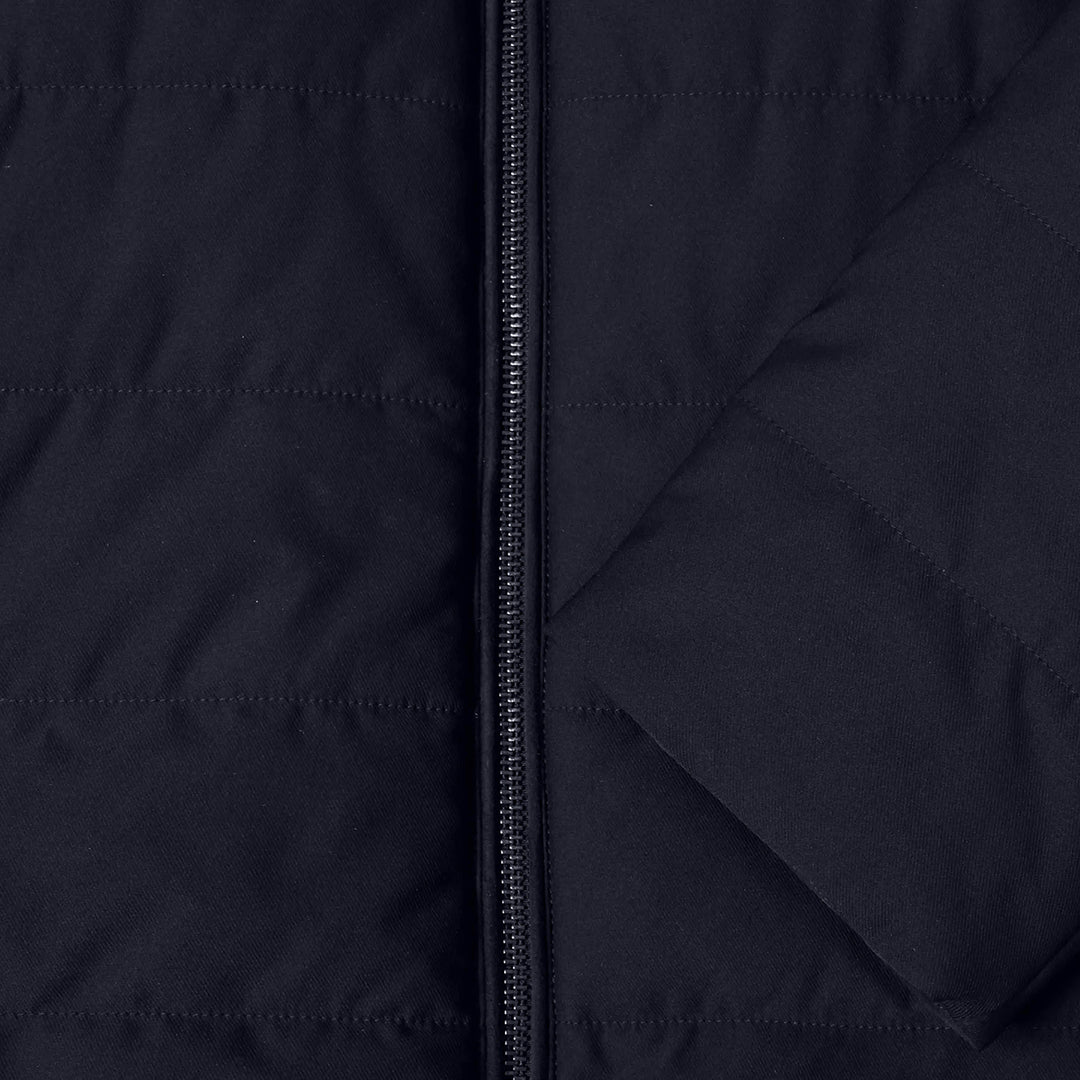 Close-up of a navy jacket with a zipper