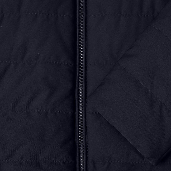 Close-up of a navy jacket with a zipper