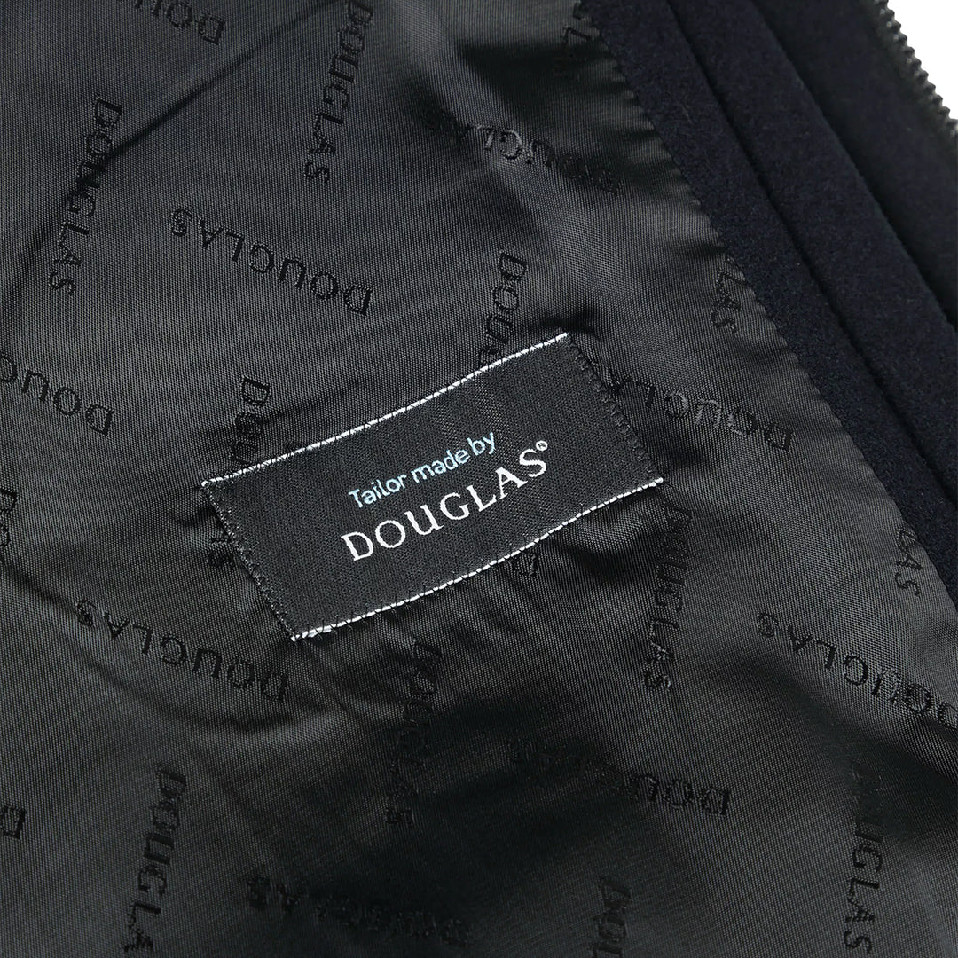 Close-up of a Douglas label on a textured fabric background