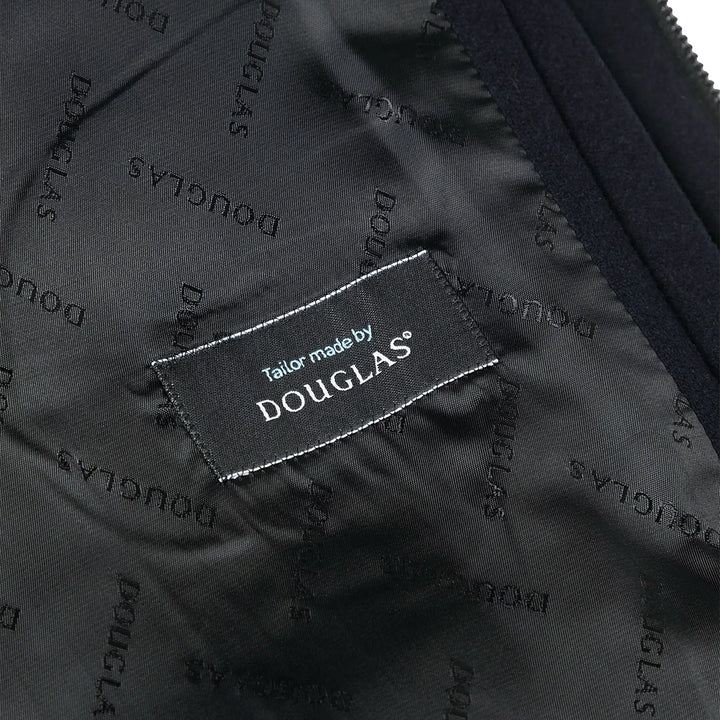 Close-up of a Douglas label on a textured fabric background