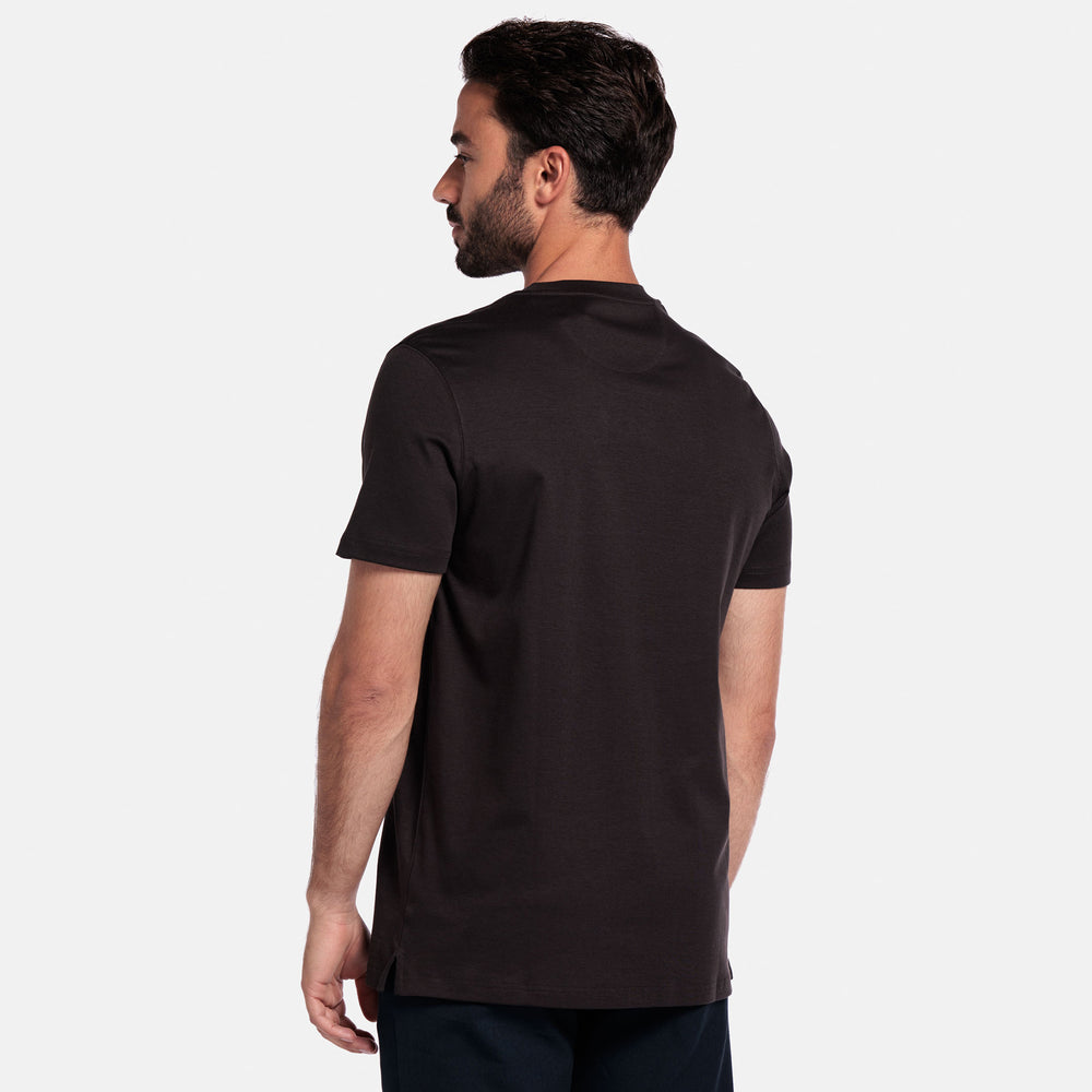 Man wearing a brown t-shirt on a white background