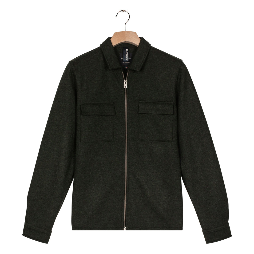 Black jacket on a hanger against a white background