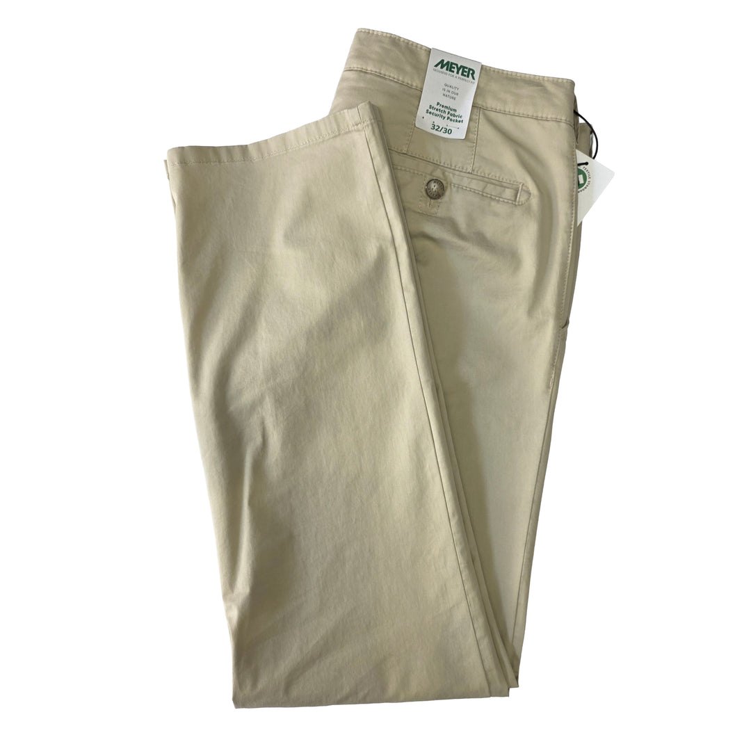 Folded beige pants with a Meyer label on a white background